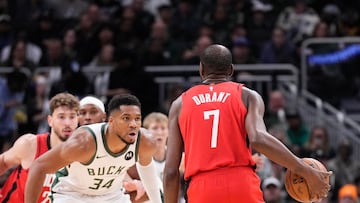Milwaukee Bucks forward Giannis Antetokounmpo (34) defends against Houston Rockets forward Kevin Durant (7) in the second half at Fiserv Forum.