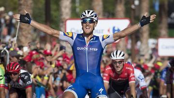 Quick-Step Floors Team's Italian cyclist Matteo Trentin celebrates as he crosses the finish line to win the 4th stage of the 72nd edition of "La Vuelta" Tour of Spain cycling race, a 198,2km route between Escaldes-Engordany to Tarragona on August 22, 2017. / AFP PHOTO / JAIME REINA