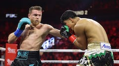 LAS VEGAS, NEVADA - MAY 04: Canelo Alvarez throws a left against Jaime Munguia in their super middleweight championship title fight at T-Mobile Arena on May 04, 2024 in Las Vegas, Nevada.   Christian Petersen/Getty Images/AFP (Photo by Christian Petersen / GETTY IMAGES NORTH AMERICA / Getty Images via AFP)