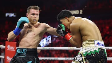 LAS VEGAS, NEVADA - MAY 04: Canelo Alvarez throws a left against Jaime Munguia in their super middleweight championship title fight at T-Mobile Arena on May 04, 2024 in Las Vegas, Nevada.   Christian Petersen/Getty Images/AFP (Photo by Christian Petersen / GETTY IMAGES NORTH AMERICA / Getty Images via AFP)