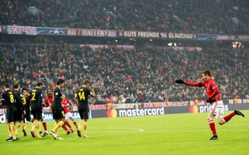 Robert Lewandowski of Bayern celebrates after he scores the opening goal