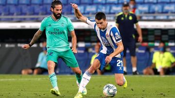 Soccer Football - La Liga Santander - Espanyol v Real Madrid - RCDE Stadium, Barcelona, Spain - June 28, 2020 Real Madrid's Isco in action with Espanyol's Marc Roca, as play resumes behind closed doors following the outbreak of the coronavirus