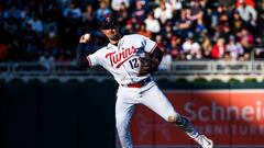 MINNEAPOLIS, MN - APRIL 07: Kyle Farmer #12 of the Minnesota Twins throws the ball to first for an out during the tenth inning of the home opener against the Houston Astros at Target Field on April 7, 2023 in Minneapolis, Minnesota.   Stephen Maturen/Getty Images/AFP (Photo by Stephen Maturen / GETTY IMAGES NORTH AMERICA / Getty Images via AFP)