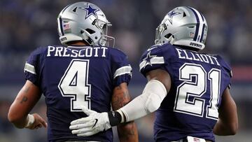 ARLINGTON, TX - NOVEMBER 24: Dak Prescott #4 of the Dallas Cowboys celebrates with Ezekiel Elliott #21 after scoring a touchdown during the fourth quarter against the Washington Redskins at AT&amp;T Stadium on November 24, 2016 in Arlington, Texas.   Tom Pennington/Getty Images/AFP
 == FOR NEWSPAPERS, INTERNET, TELCOS &amp; TELEVISION USE ONLY ==