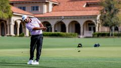 J. J. Spaun of the US hits back to the second green near the clubhouse during the first round of The Players Championship golf tournament at TPC Sawgrass in Ponte Vedra Beach, Florida.