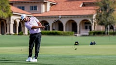 J. J. Spaun of the US hits back to the second green near the clubhouse during the first round of The Players Championship golf tournament at TPC Sawgrass in Ponte Vedra Beach, Florida.