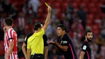 Tarjeta amarilla a  Luis Suarez
