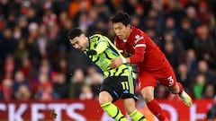 Soccer Football - Premier League - Liverpool v Arsenal - Anfield, Liverpool, Britain - December 23, 2023  Arsenal's Gabriel Martinelli in action with Liverpool's Wataru Endo REUTERS/Carl Recine NO USE WITH UNAUTHORIZED AUDIO, VIDEO, DATA, FIXTURE LISTS, CLUB/LEAGUE LOGOS OR 'LIVE' SERVICES. ONLINE IN-MATCH USE LIMITED TO 45 IMAGES, NO VIDEO EMULATION. NO USE IN BETTING, GAMES OR SINGLE CLUB/LEAGUE/PLAYER PUBLICATIONS.