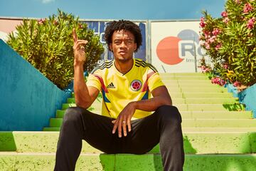 Juan Cuadrado models Colombia's new shirt.