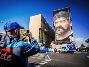 Mural of football superstar Diego Armando Maradona by Italian artist Jorit Agoch in a district known as the Bronx in San Giovanni a Teduccio, on February 28, 2017 near Naples, southern Italy.