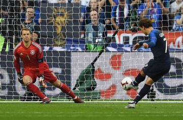 Griezmann beats Neuer from the penalty spot to clinch all three points for France.