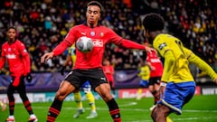 Rennes' French Ivorian defender Guela Doue (C) controls the ball during the French Cup round of 16 football match between FC Sochaux-Montbelliard (National) and Stade Rennais (L1) at the Bonal Stadium in Sochaux, eastern France, on February 6, 2024. (Photo by ARNAUD FINISTRE / AFP)