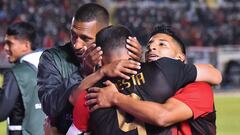Peru's Melgar Bernardo Cuesta (C) celebrates with teammates after scoring the team's second goal against Colombia's Deportivo Cali during their Copa Sudamericana football tournament round of sixteen second leg match, at the Monumental de la UNSA stadium in Arequipa, Peru, on July 6, 2022. (Photo by Diego RAMOS / AFP)
