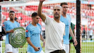 Guardiola y sus jugadores del City.