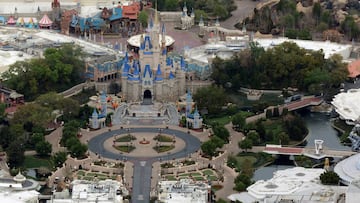 FILE PHOTO: Cinderella Castle is seen at the end of an empty Main Street at Disney's Magic Kingdom theme park after it closed in an effort to combat the spread of coronavirus disease (COVID-19), in an aerial view in Orlando, Florida, U.S. March 16, 2