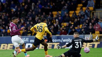 Soccer Football - Premier League - Wolverhampton Wanderers v Burnley - Molineux Stadium, Wolverhampton, Britain - October 26, 2025 Burnley's Lyle Foster scores their third goal past Wolverhampton Wanderers' Sam Johnstone Action Images via Reuters/Peter Cziborra EDITORIAL USE ONLY. NO USE WITH UNAUTHORIZED AUDIO, VIDEO, DATA, FIXTURE LISTS, CLUB/LEAGUE LOGOS OR 'LIVE' SERVICES. ONLINE IN-MATCH USE LIMITED TO 120 IMAGES, NO VIDEO EMULATION. NO USE IN BETTING, GAMES OR SINGLE CLUB/LEAGUE/PLAYER PUBLICATIONS. PLEASE CONTACT YOUR ACCOUNT REPRESENTATIVE FOR FURTHER DETAILS.. TPX IMAGES OF THE DAY