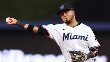 MIAMI, FLORIDA - MAY 01: Luis Arraez #3 of the Miami Marlins throws to first base for an out against the Colorado Rockies during the third inning of the game at loanDepot park on May 01, 2024 in Miami, Florida.   Megan Briggs/Getty Images/AFP (Photo by Megan Briggs / GETTY IMAGES NORTH AMERICA / Getty Images via AFP)