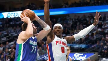 DALLAS, TX - JANUARY 30: Jalen Duren #0 of the Detroit Pistons defends against Luka Doncic #77 of the Dallas Mavericks in the first half at American Airlines Center on January 30, 2023 in Dallas, Texas. NOTE TO USER: User expressly acknowledges and agrees that, by downloading and or using this photograph, User is consenting to the terms and conditions of the Getty Images License Agreement.   Ron Jenkins/Getty Images/AFP (Photo by Ron Jenkins / GETTY IMAGES NORTH AMERICA / Getty Images via AFP)