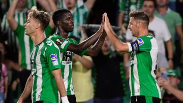 Real Betis' Spanish midfielder Joaquin (R) celebrates scoring his team's second goal with Real Betis' Ivorian midfielder Paul Akouokou (C) during the UEFA Europa League, Group C, first leg football match between Real Betis and Ludogorets Razgrad at the Benito Villamarin stadium in Seville on September 15, 2022. (Photo by CRISTINA QUICLER / AFP) (Photo by CRISTINA QUICLER/AFP via Getty Images)
