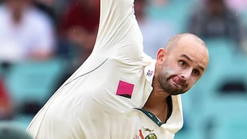 Nathan Lyon sends down a delivery against the West Indies.