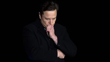 Elon Musk pauses and looks down as he speaks during a press conference at SpaceX&#039;s Starbase facility near Boca Chica Village in South Texas on February 10, 2022. - Billionaire entrepreneur Elon Musk delivered an eagerly-awaited update on SpaceX&#039;