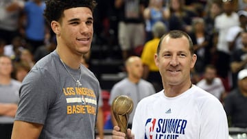 LAS VEGAS, NV - JULY 17: Lonzo Ball (L) #2 of the Los Angeles Lakers accepts the NBA Summer League 2017 Most Valuable Player award from NBA Summer League co-founder and vice president for business operations Albert Hall before the championship game of the 2017 Summer League against the Portland Trail Blazers at the Thomas & Mack Center on July 17, 2017 in Las Vegas, Nevada. Los Angeles won 110-98. NOTE TO USER: User expressly acknowledges and agrees that, by downloading and or using this photograph, User is consenting to the terms and conditions of the Getty Images License Agreement. Ethan Miller/Getty Images/AFP
== FOR NEWSPAPERS, INTERNET, TELCOS & TELEVISION USE ONLY ==
