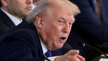 FILE PHOTO: U.S. President Donald Trump points as he attends a meeting with oil industry executives, at the White House in Washington, D.C., U.S., January 9, 2026. REUTERS/Evelyn Hockstein/File Photo