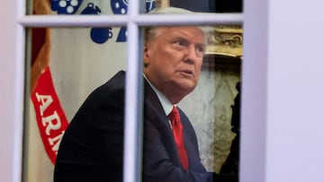 U.S. President Donald Trump sits at his desk in the Oval Office after returning from the conclusion of an event about the &quot;Operation Warp Speed&quot; program, the joint Defense Department and HHS initiative that has struck deals with several drugmake