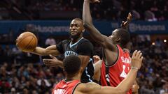 Jan 20, 2017; Charlotte, NC, USA; Charlotte Hornets guard Kemba Walker (15) drives to the basket as he is defended by Toronto Raptors guard Norman Powell (24) and forward Pascal Siakam (43) during the second half of the game at the Spectrum Center. Hornets win 113-78. Mandatory Credit: Sam Sharpe-USA TODAY Sports