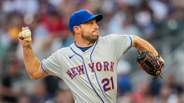 Jul 11, 2022; Cumberland, Georgia, USA; New York Mets starting pitcher Max Scherzer (21) pitches against the Atlanta Braves during the third inning at Truist Park. Mandatory Credit: Dale Zanine-USA TODAY Sports