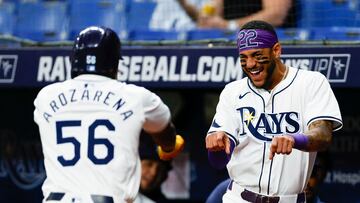 ST PETERSBURG, FLORIDA - JULY 11: Randy Arozarena #56 of the Tampa Bay Rays reacts with Jose Siri #22after hitting a two run home run during the first inning against the New York Yankees at Tropicana Field on July 11, 2024 in St Petersburg, Florida.   Douglas P. DeFelice/Getty Images/AFP (Photo by Douglas P. DeFelice / GETTY IMAGES NORTH AMERICA / Getty Images via AFP)