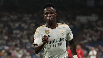 Real Madrid's Brazilian forward #07 Vinicius Junior runs with the ball during the Spanish league football match between Real Madrid CF and UD Las Palmas at the Santiago Bernabeu stadium in Madrid on September 27, 2023. (Photo by Thomas COEX / AFP)