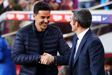 El entrenador del Barcelona Ernesto Valverde y el entrenador del Rayo Michel. 