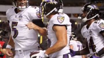 Joe Flacco y Michael Campanaro celebrado la victoria de los Baltimore Ravens