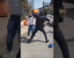 Vídeo: Policía se agarra a golpes con comerciante y pierde la pelea