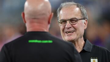Uruguay's Argentine coach Marcelo Bielsa (R) greets Bolivia's Brazilian coach Antonio Carlos Zago during the Conmebol 2024 Copa America tournament group C football match between Uruguay and Bolivia at MetLife Stadium in East Rutherford, New Jersey, on June 27, 2024 (Photo by CHARLY TRIBALLEAU / AFP)