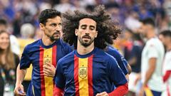 Spain's forward #22 Jesus Navas and defender #24 Marc Cucurella warm up before the start of the UEFA Euro 2024 semi-final football match between Spain and France at the Munich Football Arena in Munich on July 9, 2024. (Photo by JAVIER SORIANO / AFP)
