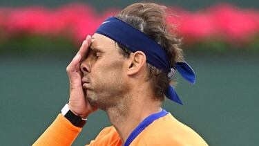 FILE PHOTO: Mar 19, 2022; Indian Wells, CA, USA; Rafael Nadal (ESP) reacts after missing a shot during a victory over Carlos Alcaraz (ESP) in their semifinal match in the BNP Paribas Open at the Indian Wells Tennis Garden. Mandatory Credit: Jayne Kamin-On