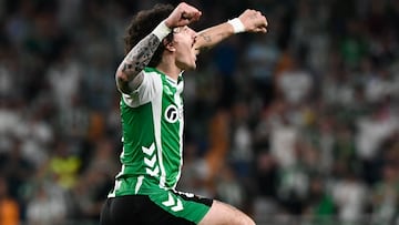Real Betis' Spanish defender #02 Hector Bellerin celebrates scoring his team's first goal during the Spanish league football match between Real Betis and Real Madrid CF at the La Cartuja stadium in Seville on April 24 , 2026. (Photo by CRISTINA QUICLER / AFP)