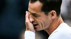 Britain's Andy Murray cries as he delivers a speech at the end of his men's doubles tennis match with his brother Britain's Jamie Murray, during a farewell ceremony to celebrate his last Wimbledon, on the fourth day of the 2024 Wimbledon Championships at The All England Lawn Tennis and Croquet Club in Wimbledon, southwest London, on July 4, 2024. (Photo by Ben Stansall / AFP) / RESTRICTED TO EDITORIAL USE