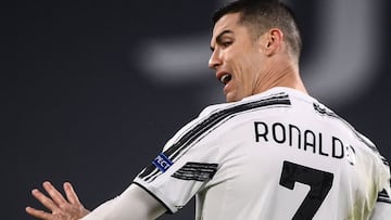 Juventus' Portuguese forward Cristiano Ronaldo reacts during the UEFA Champions League round of 16 second leg football match between Juventus Turin and FC Porto on March 9, 2021 at the Juventus stadium in Turin. (Photo by Marco BERTORELLO / AFP)