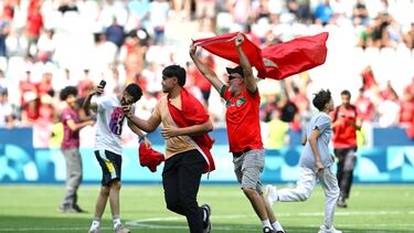 SAINT-ETIENNE, FRANCE - JULY 24: Fans of Morocco invade the pitch during the Men's group B match between Argentina and Morocco during the Olympic Games Paris 2024 at Stade Geoffroy-Guichard on July 24, 2024 in Saint-Etienne, France. (Photo by Tullio M. Puglia/Getty Images)