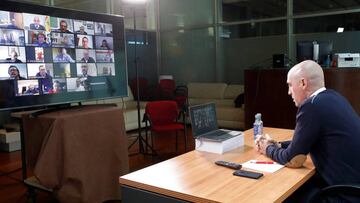 Las Rozas (Spain), 25/03/2020.- A handout photo made available by the Royal Spanish Soccer Federation (RFEF) shows the federation's president, Luis Rubiales (R), during a video-conference meeting with the heads of regional soccer federations in Las R