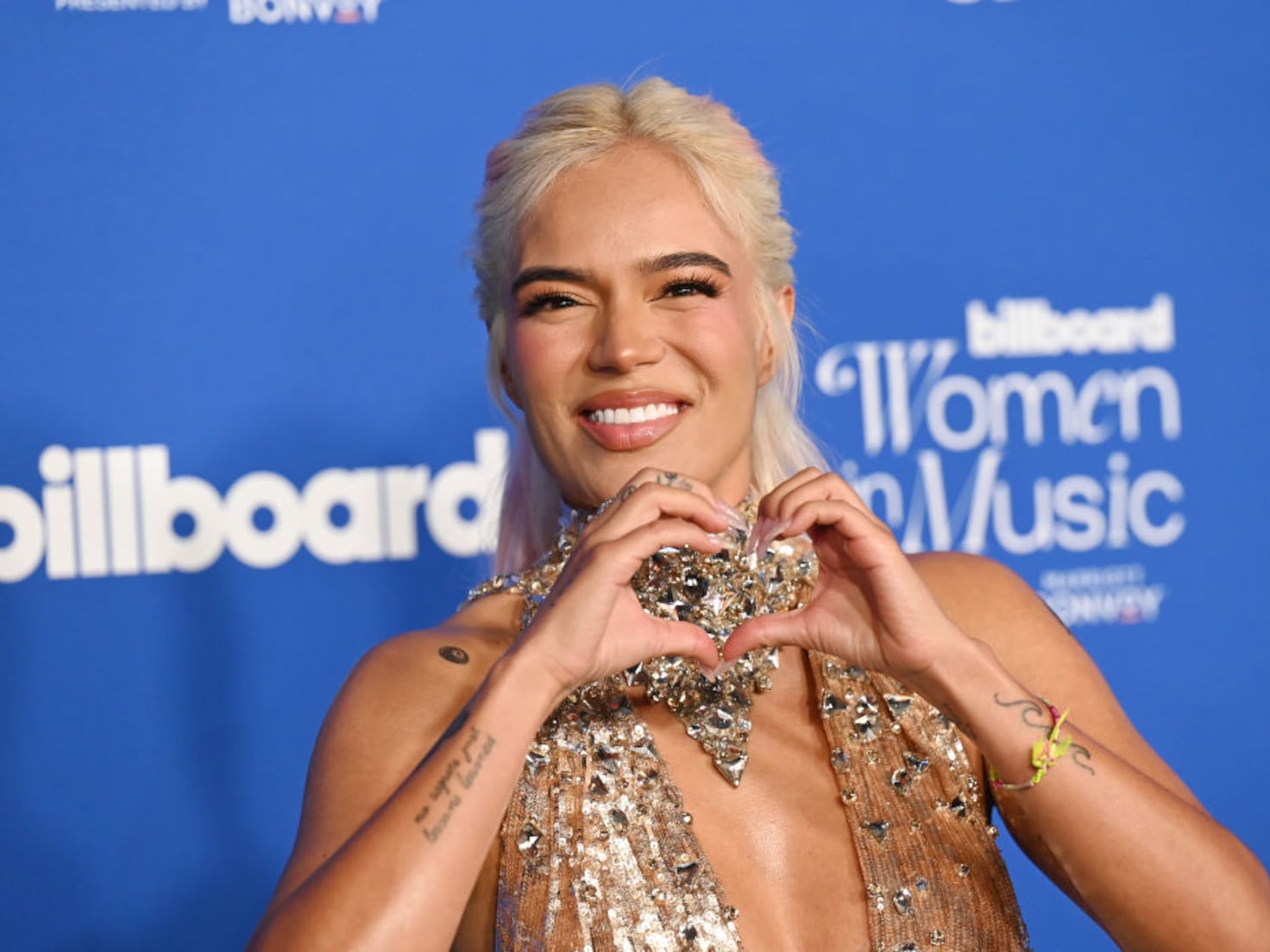 What Does Karol G’s 200 Copas Tattoo Mean?