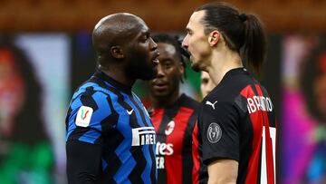 MILAN, ITALY - JANUARY 26: Romelu Lukaku of FC Internazionale clashes with Zlatan Ibrahimovic of AC Milan during the Coppa Italia match between FC Internazionale and AC Milan at Stadio Giuseppe Meazza on January 26, 2021 in Milan, Italy. Sporting stadiums