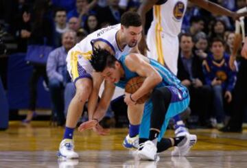 Klay Thompson y Jeremy Lin.