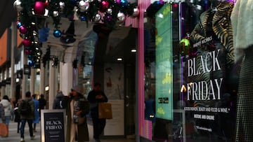Black Friday signage is displayed on the shop window of Harvey Nichols in Manchester, Britain, November 22, 2023. REUTERS/Molly Darlington