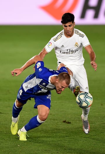 Marco Asensio y Rodrigo Ely.