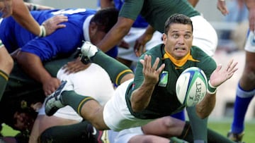 (FILES) This file photo taken on November 01, 2003 shows South African scrum-half Joost van der Westhuizen clearing the ball out of the scrum during the Rugby World Cup Pool C match between South Africa and Samoa at Lang Park in Brisbane, 01 November. 
 South African rugby legend Joost van der Westhuizen died on February 6, 2017 aged 45 after a five-year battle with motor neurone disease, his charity foundation said. / AFP PHOTO / Greg Wood