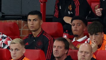 Soccer Football - Premier League - Manchester United v Liverpool - Old Trafford, Manchester, Britain - August 22, 2022 Manchester United's Cristiano Ronaldo and Jadon Sancho on the substitutes bench  REUTERS/Phil Noble EDITORIAL USE ONLY. No use with unauthorized audio, video, data, fixture lists, club/league logos or 'live' services. Online in-match use limited to 75 images, no video emulation. No use in betting, games or single club /league/player publications.  Please contact your account representative for further details.